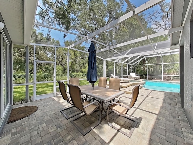 15024 Eaglepark Pl, Lithia, FL 33547 - view of patio featuring glass enclosure, an outdoor pool, and outdoor dining space