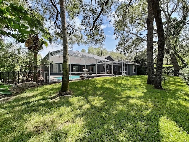 15024 Eaglepark Pl, Lithia, FL 33547 - view of grassy yard featuring a lanai