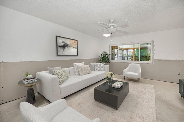 1660 Cape Ann Ave NE Unit 2, Saint Petersburg, FL 33702 - living area featuring a textured ceiling and ceiling fan