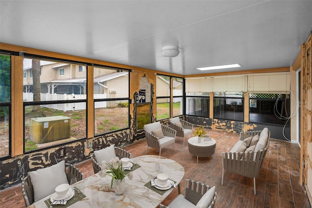 1660 Cape Ann Ave NE Unit 2, Saint Petersburg, FL 33702 - sunroom featuring outdoor lounge area