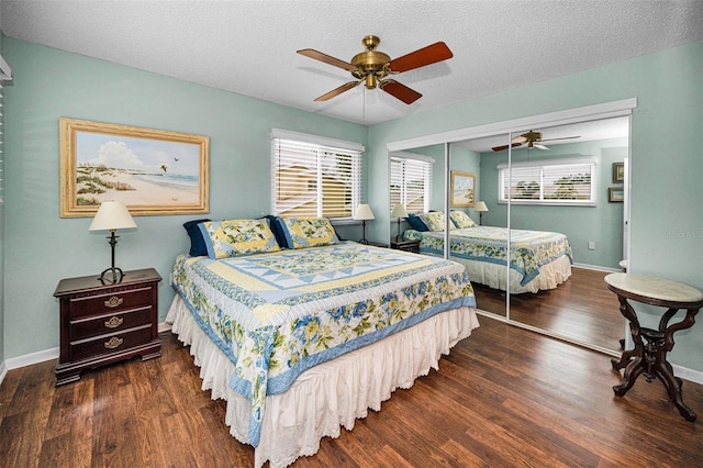 1660 Cape Ann Ave NE Unit 2, Saint Petersburg, FL 33702 - bedroom with wood finished floors, a closet, a ceiling fan, a textured ceiling, and baseboards