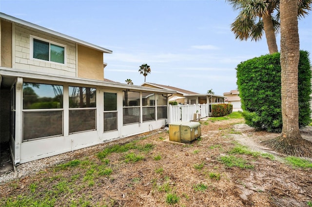 1660 Cape Ann Ave NE Unit 2, Saint Petersburg, FL 33702 - view of yard with a sunroom