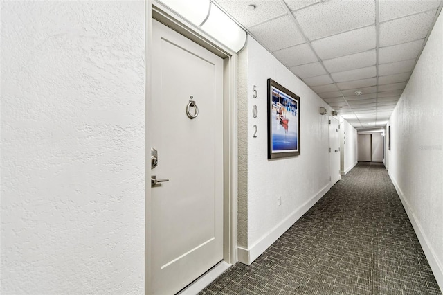 400 Island Way Unit 502, Clearwater Beach, FL 33767 - hallway featuring carpet, a drop ceiling, and a textured wall