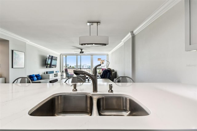 400 Island Way Unit 502, Clearwater Beach, FL 33767 - kitchen with open floor plan, crown molding, a ceiling fan, and light stone counters