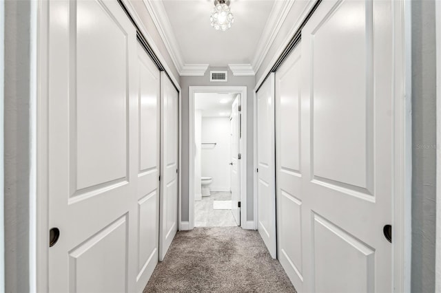 400 Island Way Unit 502, Clearwater Beach, FL 33767 - hallway with carpet and ornamental molding