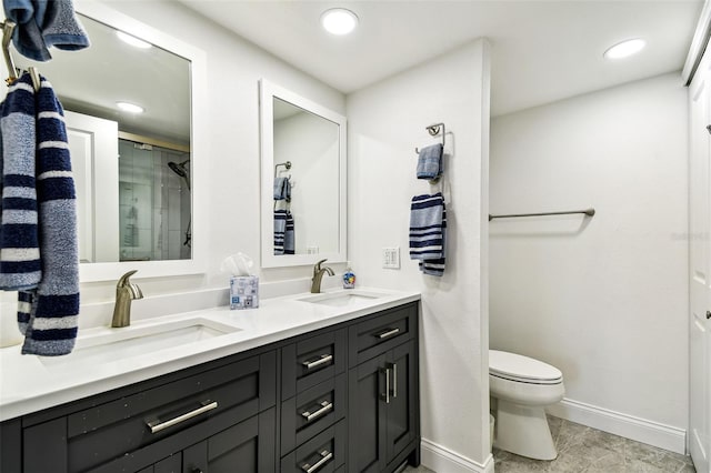 400 Island Way Unit 502, Clearwater Beach, FL 33767 - bathroom featuring double vanity, recessed lighting, and a shower with door