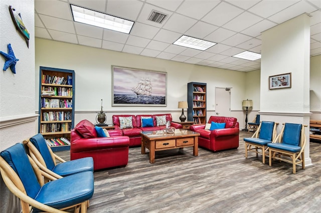 400 Island Way Unit 502, Clearwater Beach, FL 33767 - living room with wood finished floors and a drop ceiling