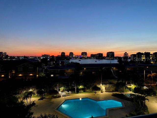 400 Island Way Unit 502, Clearwater Beach, FL 33767 - community pool with a patio and a city view