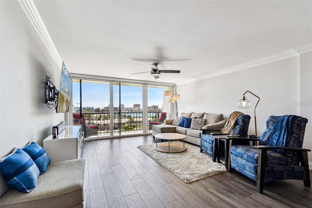 400 Island Way Unit 502, Clearwater Beach, FL 33767 - living room featuring crown molding, wood finished floors, a ceiling fan, and a wall of windows