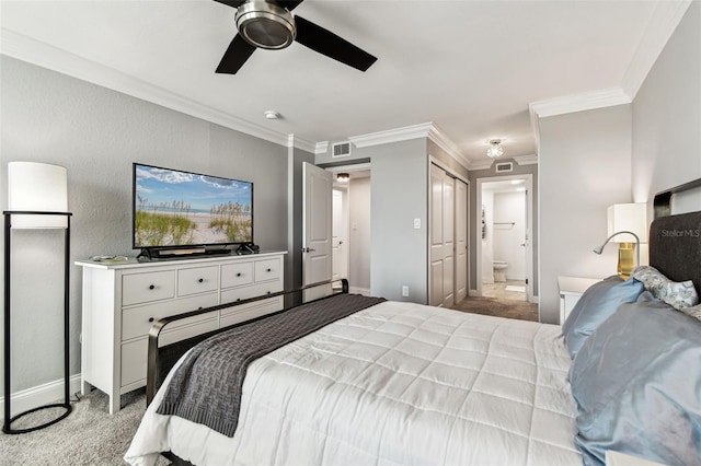 400 Island Way Unit 502, Clearwater Beach, FL 33767 - bedroom with light colored carpet, ornamental molding, ensuite bath, and a ceiling fan