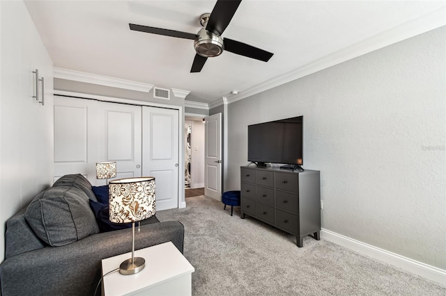 400 Island Way Unit 502, Clearwater Beach, FL 33767 - living room featuring a ceiling fan, light colored carpet, and crown molding
