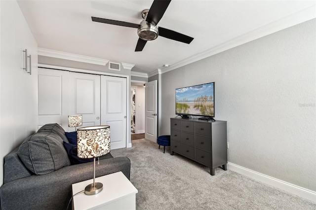 400 Island Way Unit 502, Clearwater Beach, FL 33767 - living area with ceiling fan, light colored carpet, and ornamental molding