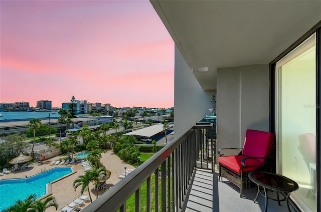 400 Island Way Unit 502, Clearwater Beach, FL 33767 - balcony featuring view of pool area and a water view