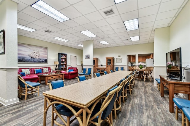 400 Island Way Unit 502, Clearwater Beach, FL 33767 - dining area featuring wood finished floors and a paneled ceiling