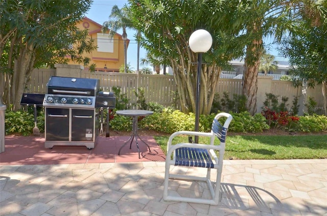 400 Island Way Unit 502, Clearwater Beach, FL 33767 - view of patio featuring area for grilling