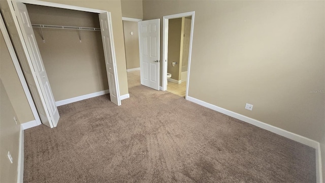 11341 Durham St, Parrish, FL 34219 - unfurnished bedroom with carpet and a closet