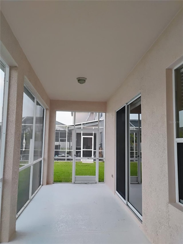 11341 Durham St, Parrish, FL 34219 - unfurnished sunroom featuring healthy amount of natural light