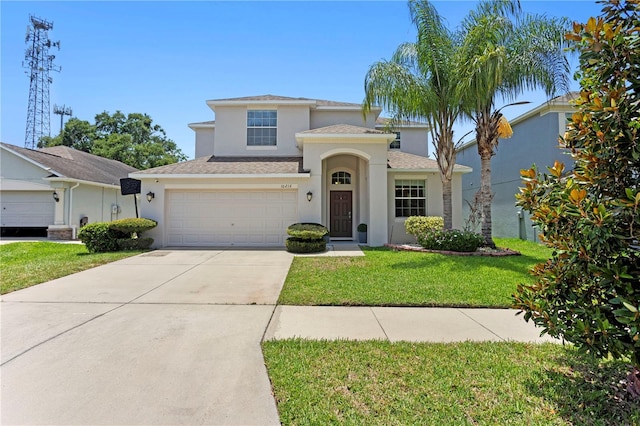 10216 Summer Azure Dr, Riverview, FL 33578 - view of front of property with stucco siding, driveway, a front lawn, and an attached garage