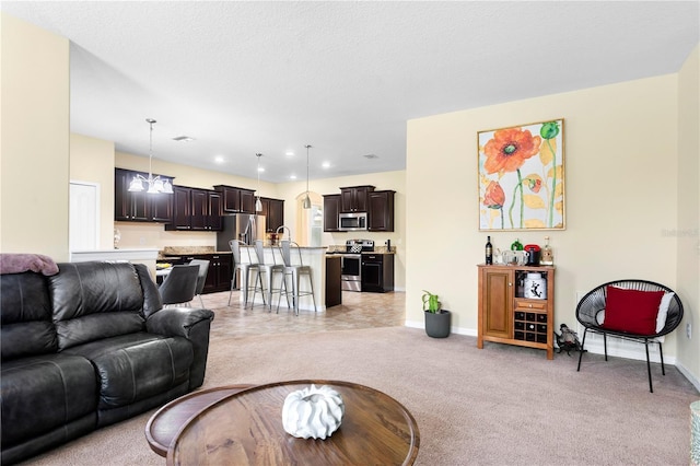 10216 Summer Azure Dr, Riverview, FL 33578 - living room featuring light carpet and recessed lighting