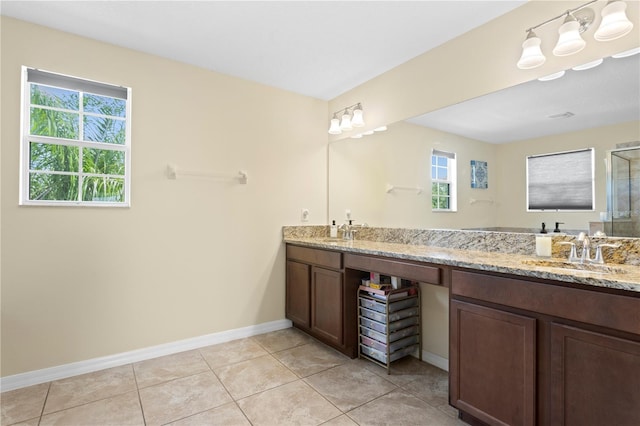 10216 Summer Azure Dr, Riverview, FL 33578 - bathroom with double vanity, a shower with door, and tile patterned floors
