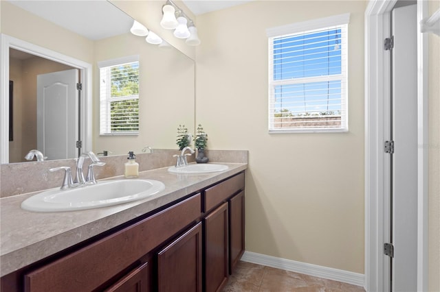 10216 Summer Azure Dr, Riverview, FL 33578 - bathroom featuring double vanity and tile patterned flooring