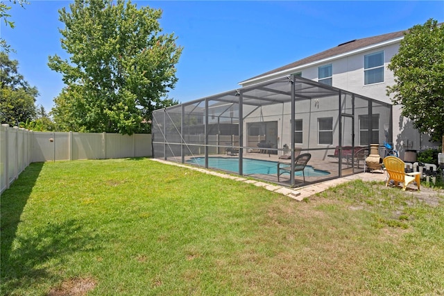 10216 Summer Azure Dr, Riverview, FL 33578 - fenced backyard featuring a lanai and a patio