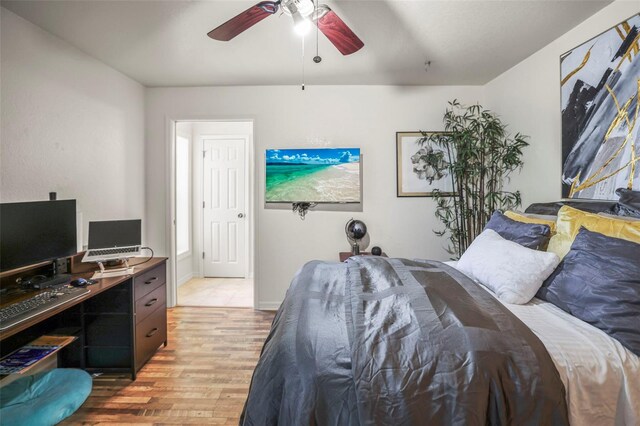 630 Mac Crillus Rd, Largo, FL 33770 - bedroom featuring light wood-style flooring, an office area, and ceiling fan