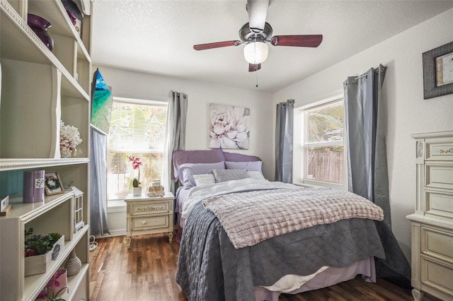 630 Mac Crillus Rd, Largo, FL 33770 - bedroom featuring wood finished floors, ceiling fan, and a textured ceiling