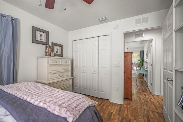 630 Mac Crillus Rd, Largo, FL 33770 - bedroom with dark wood-type flooring, a closet, and ceiling fan
