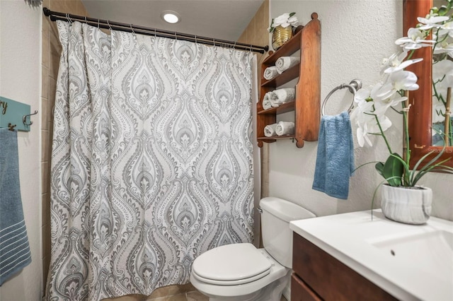 630 Mac Crillus Rd, Largo, FL 33770 - bathroom with vanity, a shower with shower curtain, and a textured wall