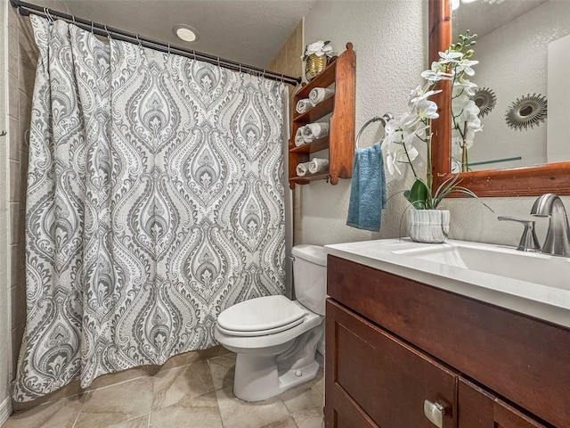 630 Mac Crillus Rd, Largo, FL 33770 - bathroom featuring vanity, a textured wall, stone finish flooring, and curtained shower