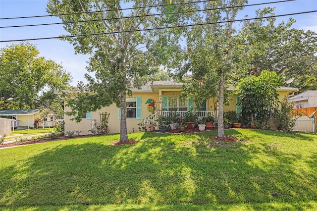 630 Mac Crillus Rd, Largo, FL 33770 - view of property hidden behind natural elements with stucco siding