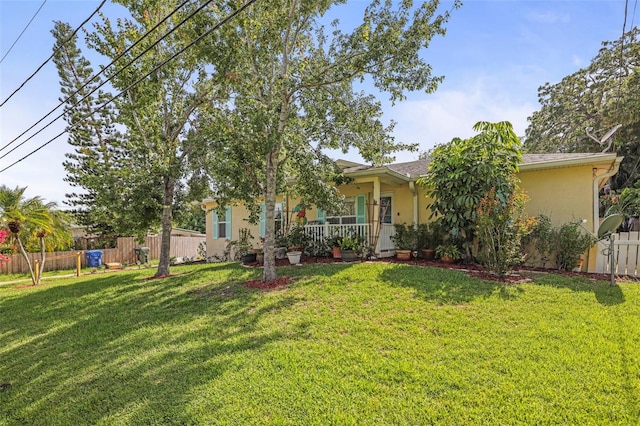 630 Mac Crillus Rd, Largo, FL 33770 - view of front of home featuring stucco siding and covered porch