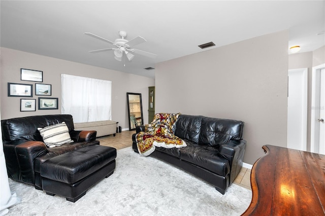 12400 Park Blvd Unit 417, Seminole, FL 33772 - living area with tile patterned floors and ceiling fan