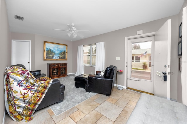 12400 Park Blvd Unit 417, Seminole, FL 33772 - living room featuring healthy amount of natural light and ceiling fan