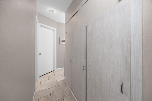 12400 Park Blvd Unit 417, Seminole, FL 33772 - hall with light tile patterned flooring