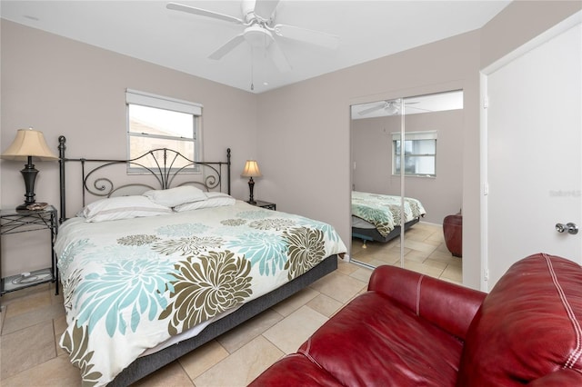12400 Park Blvd Unit 417, Seminole, FL 33772 - bedroom featuring multiple windows, tile patterned flooring, and a ceiling fan