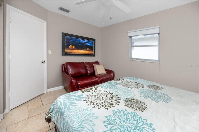 12400 Park Blvd Unit 417, Seminole, FL 33772 - bedroom with light tile patterned floors and a ceiling fan