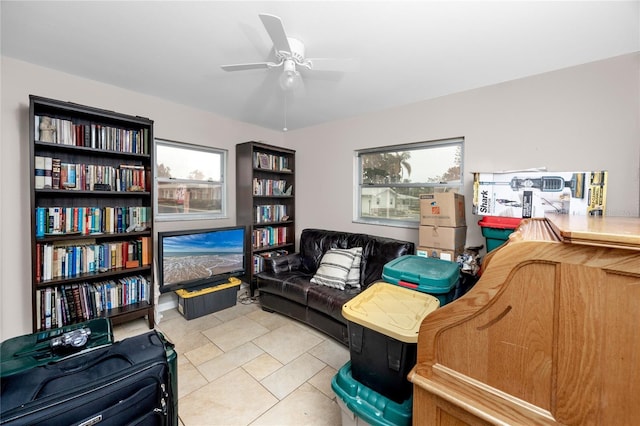 12400 Park Blvd Unit 417, Seminole, FL 33772 - office area with healthy amount of natural light, a ceiling fan, and light tile patterned floors