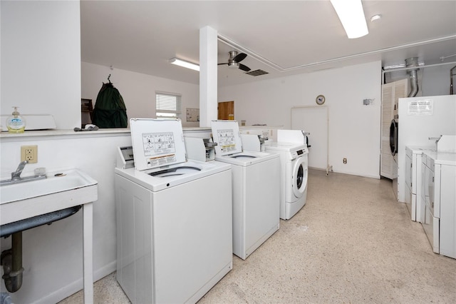 12400 Park Blvd Unit 417, Seminole, FL 33772 - community laundry with washing machine and dryer, a ceiling fan, and attic access