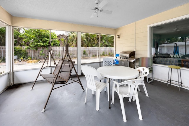 12400 Park Blvd Unit 417, Seminole, FL 33772 - sunroom / solarium featuring a ceiling fan and outdoor dining area