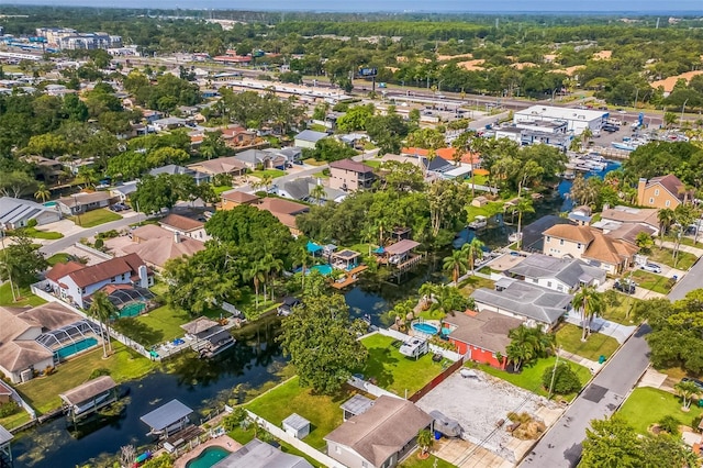 51 Cypress Dr, Palm Harbor, FL 34684 - aerial overview of property's location featuring nearby suburban area and a large body of water