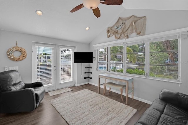 51 Cypress Dr, Palm Harbor, FL 34684 - living room featuring vaulted ceiling, ceiling fan, healthy amount of natural light, wood finished floors, and recessed lighting