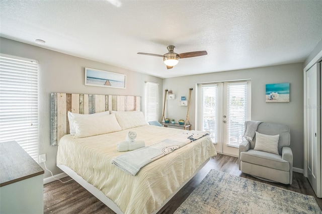 51 Cypress Dr, Palm Harbor, FL 34684 - bedroom with french doors, access to outside, wood finished floors, ceiling fan, and a textured ceiling