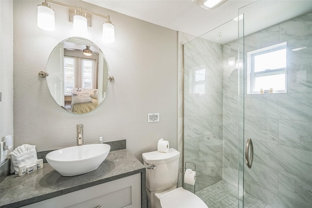51 Cypress Dr, Palm Harbor, FL 34684 - bathroom featuring healthy amount of natural light, a shower stall, and vanity