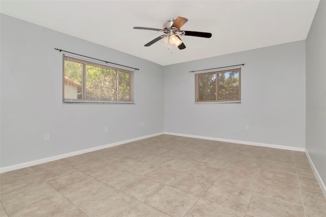 8626 Woodbridge Dr, New Port Richey, FL 34655 - empty room featuring ceiling fan and light tile patterned floors