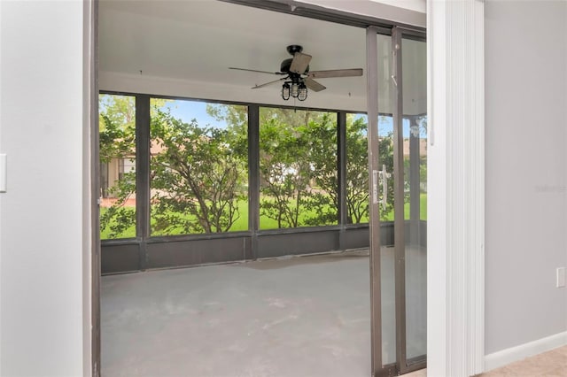 8626 Woodbridge Dr, New Port Richey, FL 34655 - unfurnished sunroom with a ceiling fan