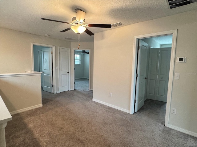 4448 Globe Thistle, Tampa, FL 33619 - carpeted empty room featuring a ceiling fan and a textured ceiling