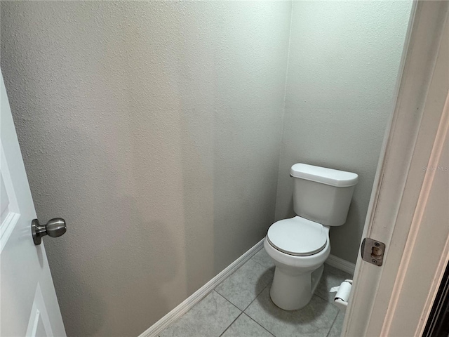 4448 Globe Thistle, Tampa, FL 33619 - bathroom featuring tile patterned floors and toilet