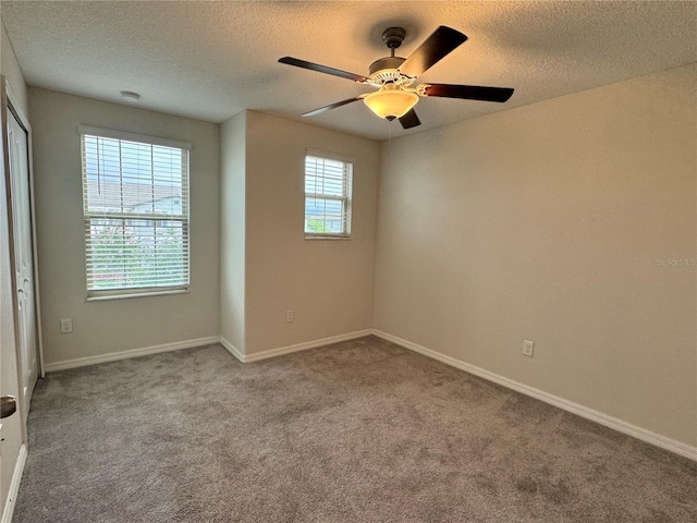 4448 Globe Thistle, Tampa, FL 33619 - unfurnished room featuring a textured ceiling, carpet flooring, and ceiling fan